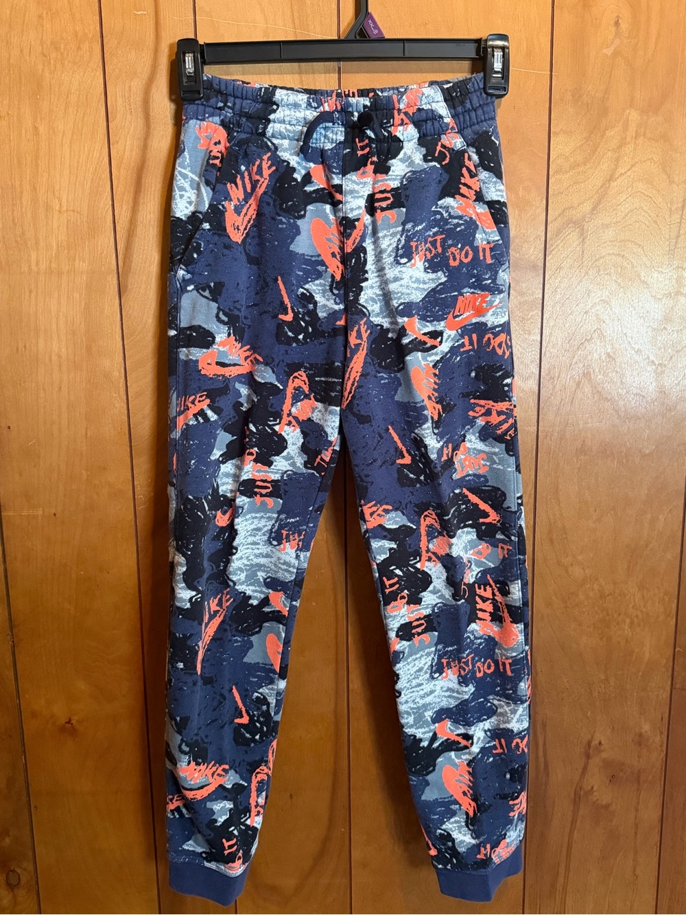 Nike Navy and Orange Allover Logo Joggers